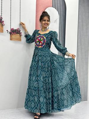 Navratri wear green bandhni printed gamathi & mirror work long flared gown 1