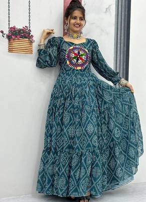 Navratri wear green bandhni printed gamathi & mirror work long flared gown 2