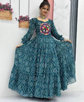Navratri wear green bandhni printed gamathi & mirror work long flared gown 3