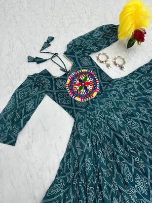 Navratri wear green bandhni printed gamathi & mirror work long flared gown 4