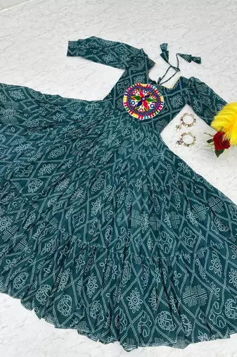 Navratri wear green bandhni printed gamathi & mirror work long flared gown