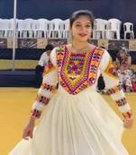 Navratri wear off-white color fiyona silk gamthi & mirror work gown full stitched.