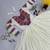 Navratri wear off-white color fiyona silk gamthi & mirror work gown full stitched.