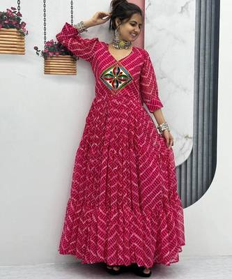 Navratri wear pink bandhni printed gamathi & mirror work long flared gown 1