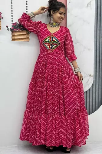 Navratri wear pink bandhni printed gamathi & mirror work long flared gown