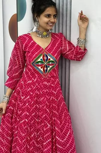 Navratri wear pink bandhni printed gamathi & mirror work long flared gown