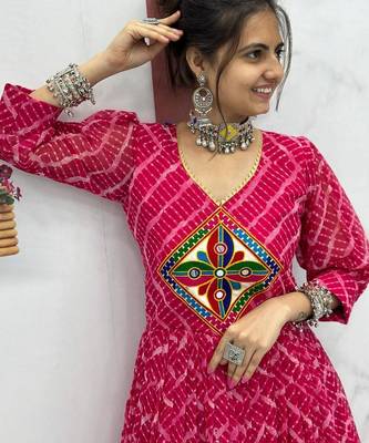 Navratri wear pink bandhni printed gamathi & mirror work long flared gown 4