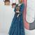 Navratri wear rama blue color bandhni printed gamathi & mirror work long flared gown full stitched.