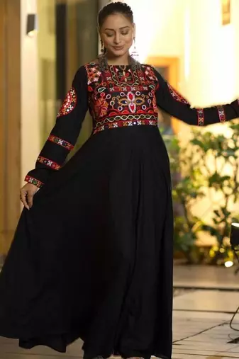 Navratri wear black georgette gamathi & mirror work long flared gown full stitched.