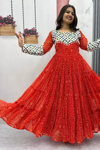 Navratri wear red faux georgette gamathi & kodi lace work long flared gown full stitched.