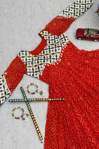 Navratri wear red faux georgette gamathi & kodi lace work long flared gown full stitched.