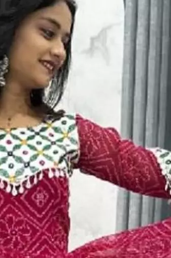 Navratri wear pink faux georgette gamathi & kodi lace work long flared gown