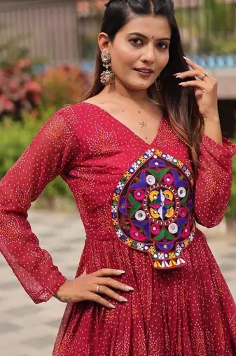Navratri wear maroon georgette bandhni printed gamthi & mirror work gown