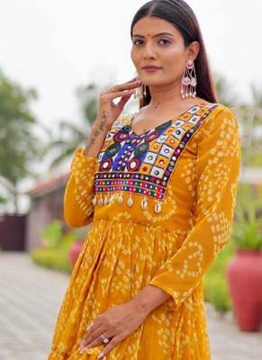 Navratri wear yellow georgette bandhni printed thread embroidered mirror -codi lace work gown 4