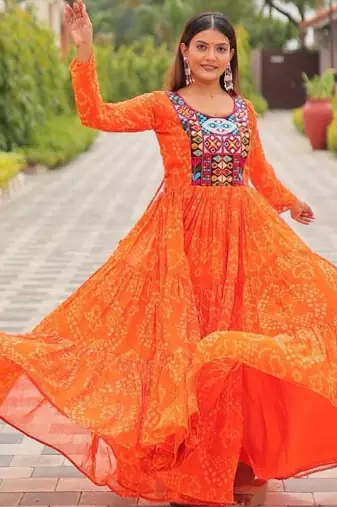 Navratri wear orange georgette bandhni printed thread embroidered mirror work gown