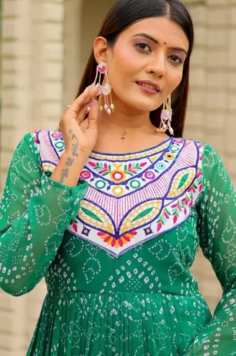 Navratri wear green georgette bandhni printed thread embroidered mirror work gown
