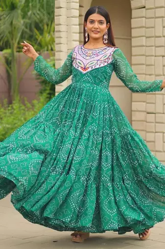 Navratri wear green georgette bandhni printed thread embroidered mirror work gown