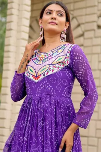 Navratri wear purple georgette bandhni printed thread embroidered mirror work gown