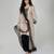 Champagne beige embroidered texture silk kurta black dhoti set