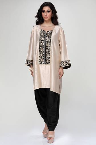 Champagne beige embroidered texture silk kurta and black dhoti salwar