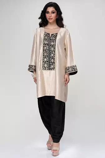 Champagne beige embroidered texture silk kurta and black dhoti salwar