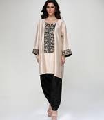 Champagne beige embroidered texture silk kurta and black dhoti salwar