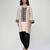 Champagne beige embroidered texture silk kurta and black dhoti salwar