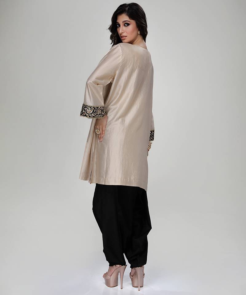 Champagne beige embroidered texture silk kurta and black dhoti salwar