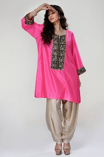 Fuchsia pink embroidered texture silk kurta and beige dhoti salwar