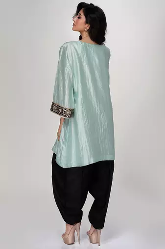 Powder blue embroidered texture silk kurta and black dhoti salwar