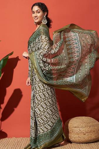 Green elegant printed georgette saree with blouse piece