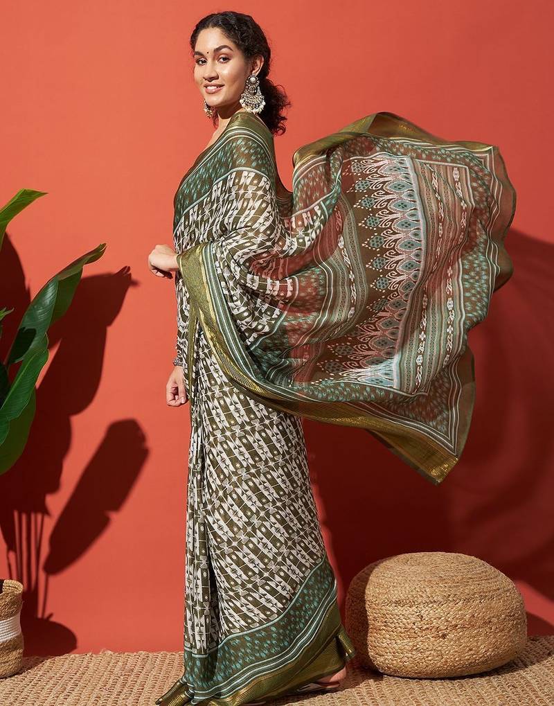 Green elegant printed georgette saree with blouse piece
