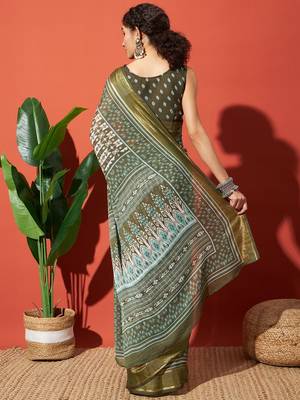 Green elegant printed georgette saree with blouse piece 2