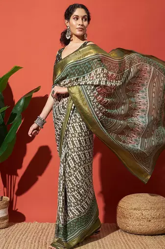 Green elegant printed georgette saree with blouse piece