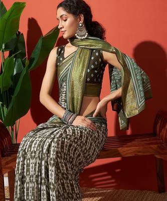 Green elegant printed georgette saree with blouse piece 4