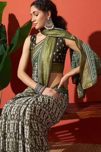 Green elegant printed georgette saree with blouse piece