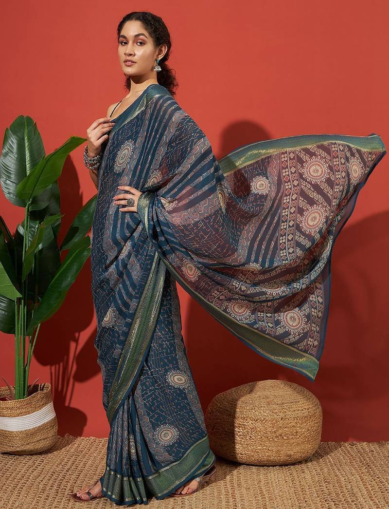 Blue elegant printed georgette saree with blouse piece