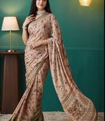 Brown elegant printed georgette saree with blouse piece