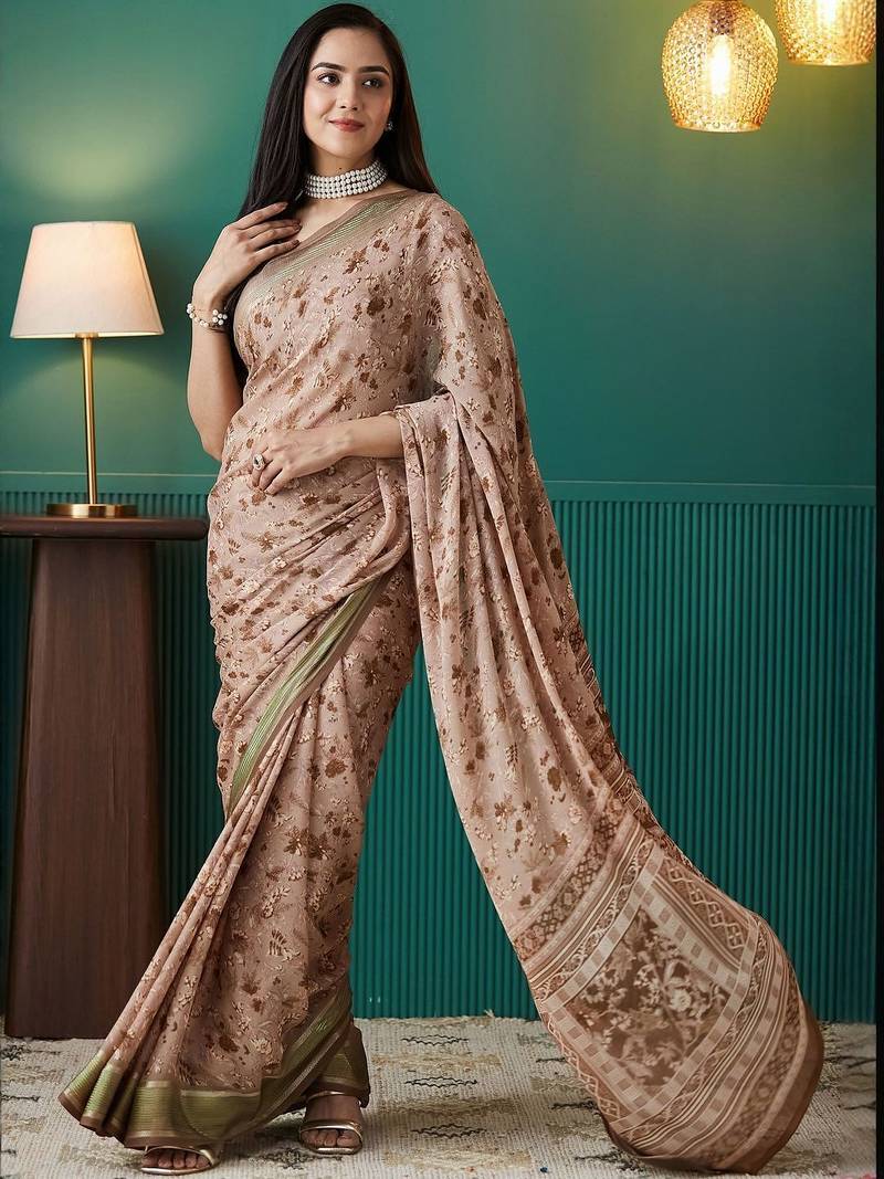 Brown elegant printed georgette saree with blouse piece