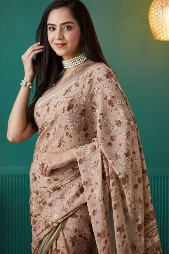 Brown elegant printed georgette saree with blouse piece