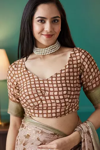 Brown elegant printed georgette saree with blouse piece