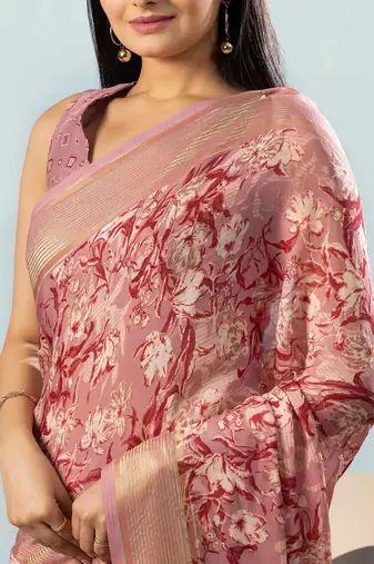 Peach elegant printed georgette saree with blouse piece