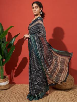 Teal elegant printed georgette saree with blouse piece 1