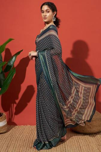 Teal elegant printed georgette saree with blouse piece