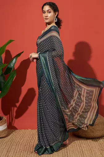 Teal elegant printed georgette saree with blouse piece
