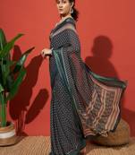 Teal elegant printed georgette saree with blouse piece