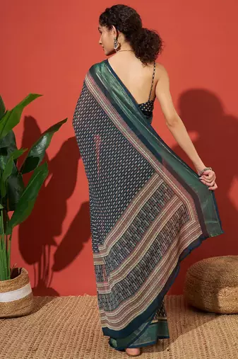 Teal elegant printed georgette saree with blouse piece