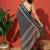 Teal elegant printed georgette saree with blouse piece