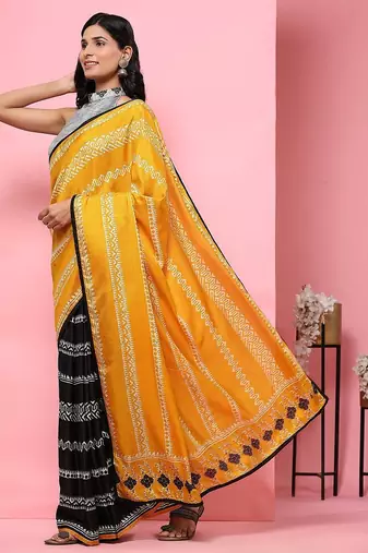 Gold printed silk blend ethnic saree with blouse piece