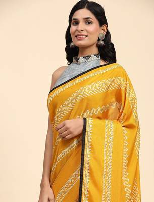 Gold printed silk blend ethnic saree with blouse piece 5